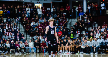 Basketball player standing on court