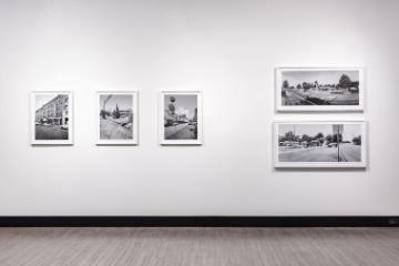 artwork of photos on wall