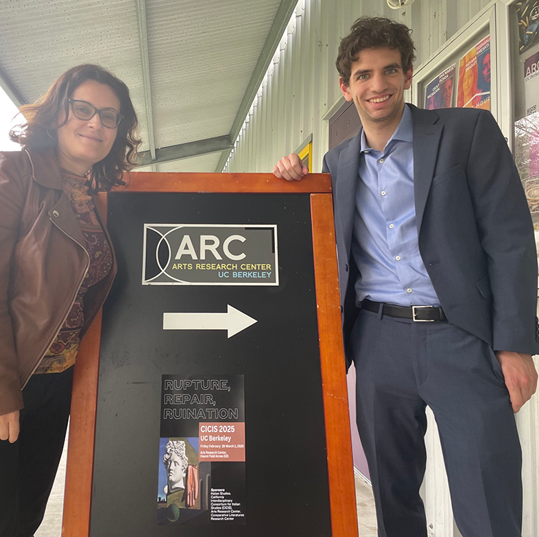 Evelyn Ferraro and Agustin Pace standing next to Arts Research Center sign