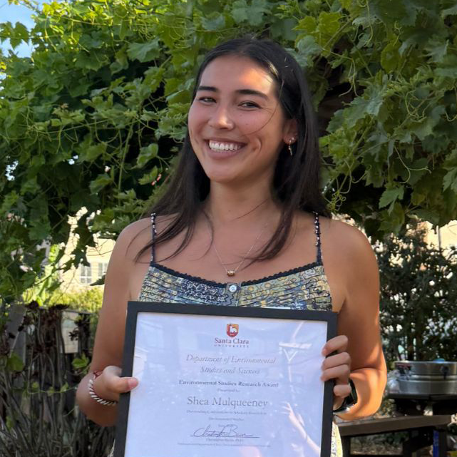 Shea Mulqueeny holding her award