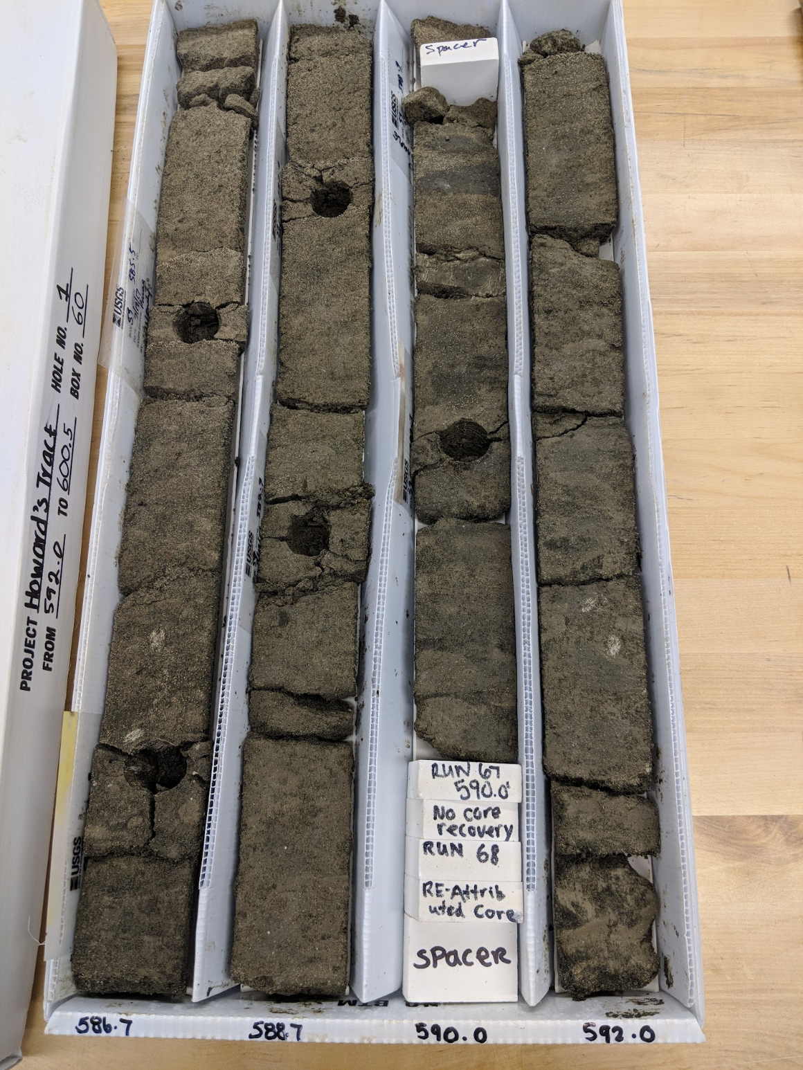 tmage by Will Rush shows a soil core from Howards Tract on the Eastern Shore of Maryland, containing a sediment sequence across the Paleocene-Eocene boundary, roughly 55 million years ago. The holes are where samples were taken.