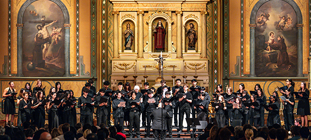 Concert choir performing in Mission Santa Clara 