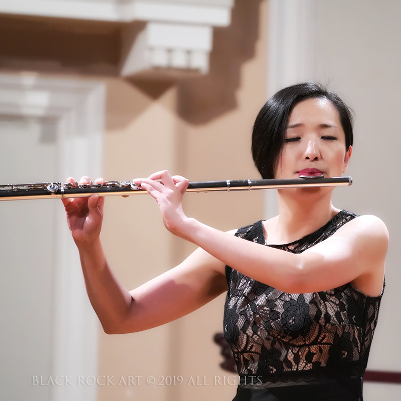 Yingying Wang playing the flute