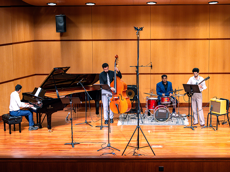 four musicians on stage in the Music Recital Hall
