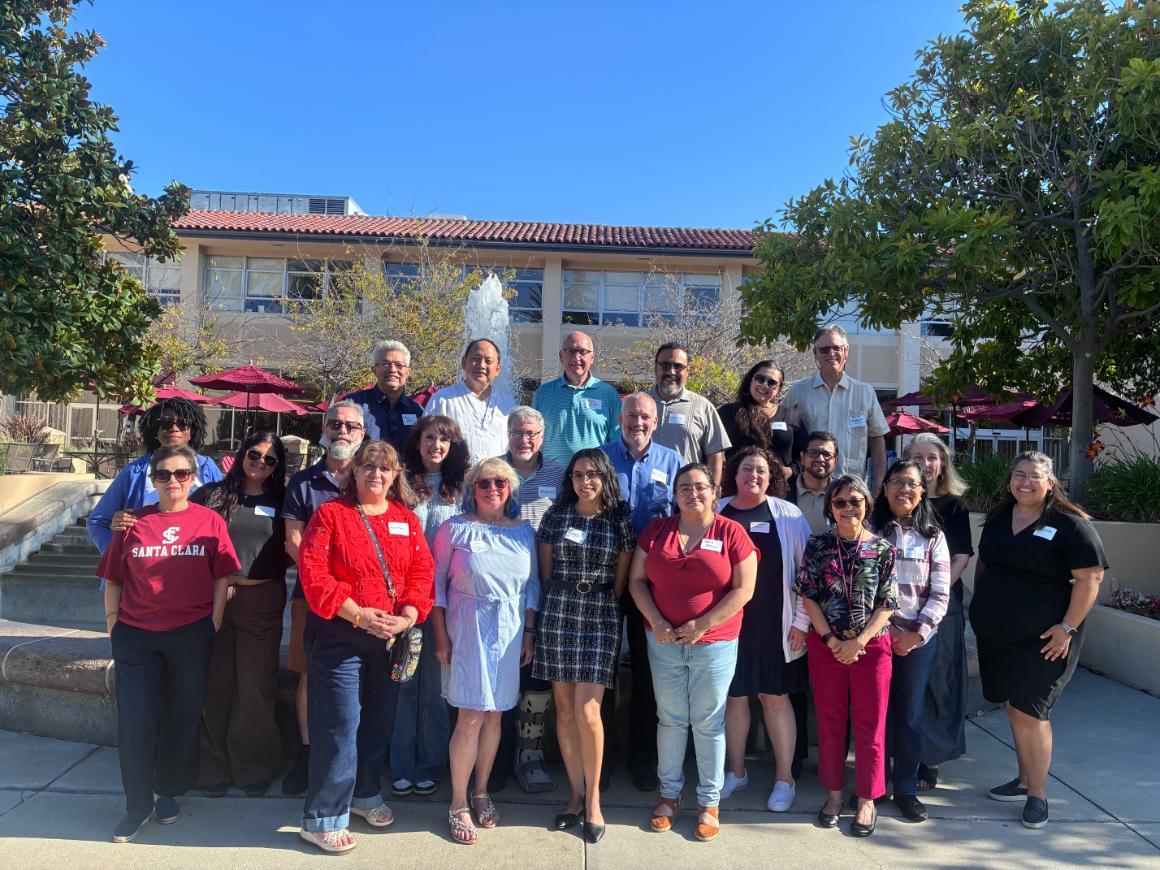 GPPM Students, Faculty and Staff stand in front of Benson fountain