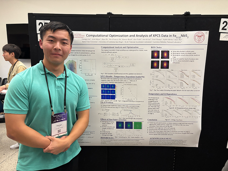 Guangyi Liu standing next to his research poster