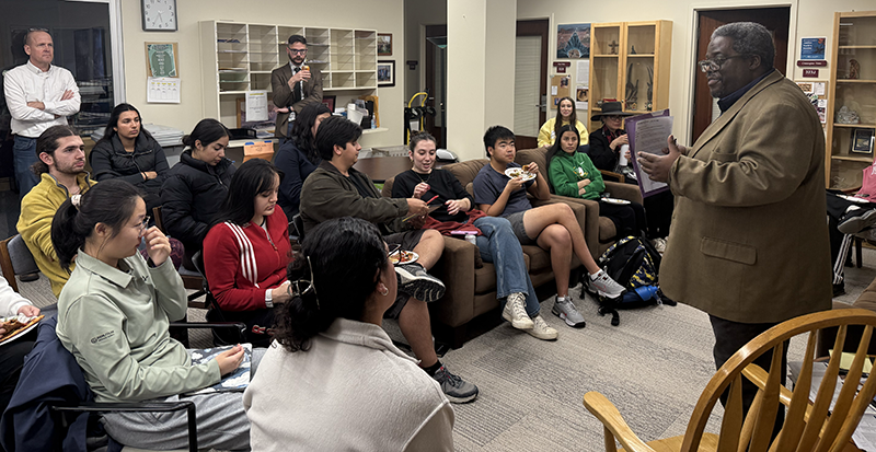 Students gather in the RS office to hear Karl Lampley.