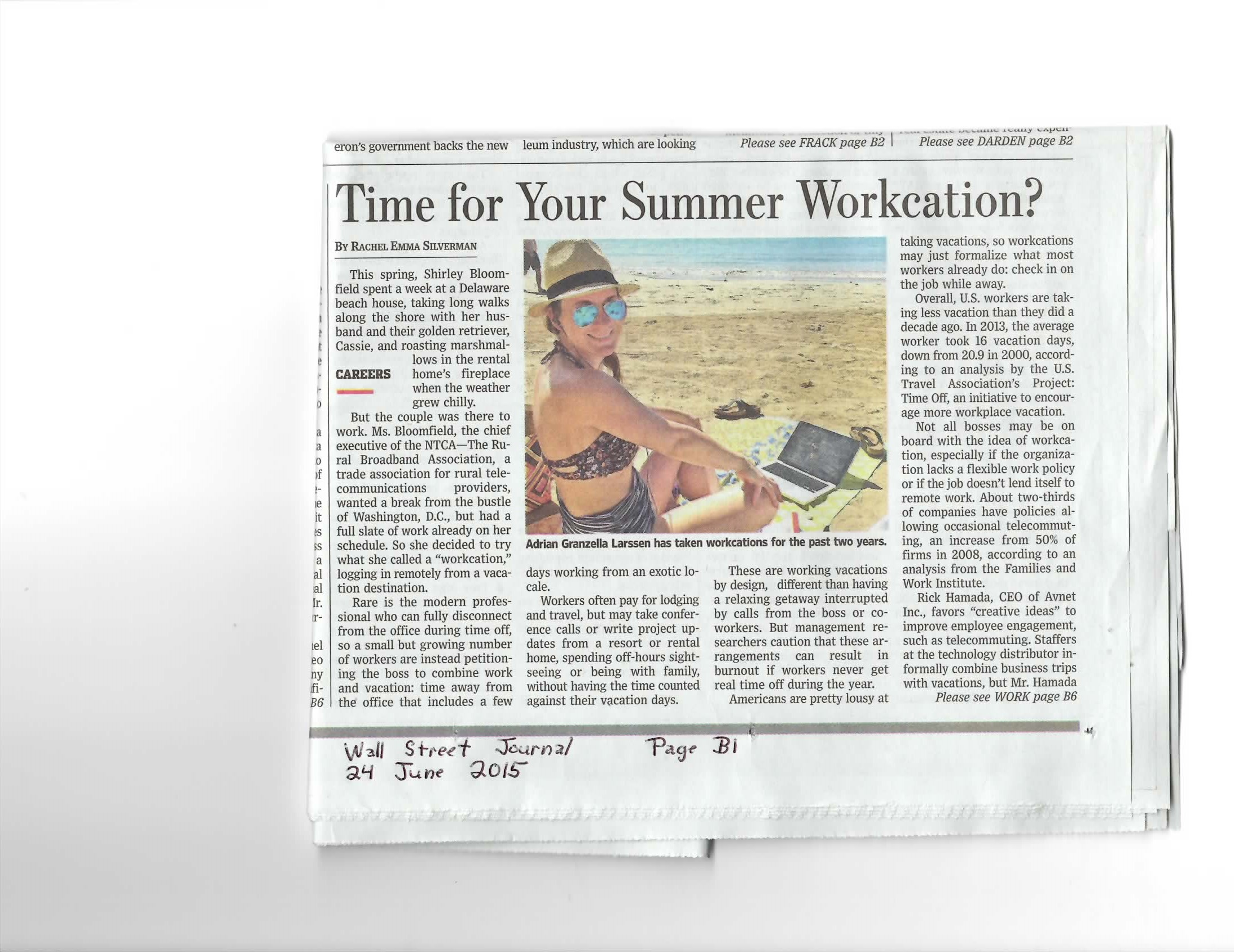 Newspaper article titled Time for Your Summer Workcation? with an image of a person on a beach.