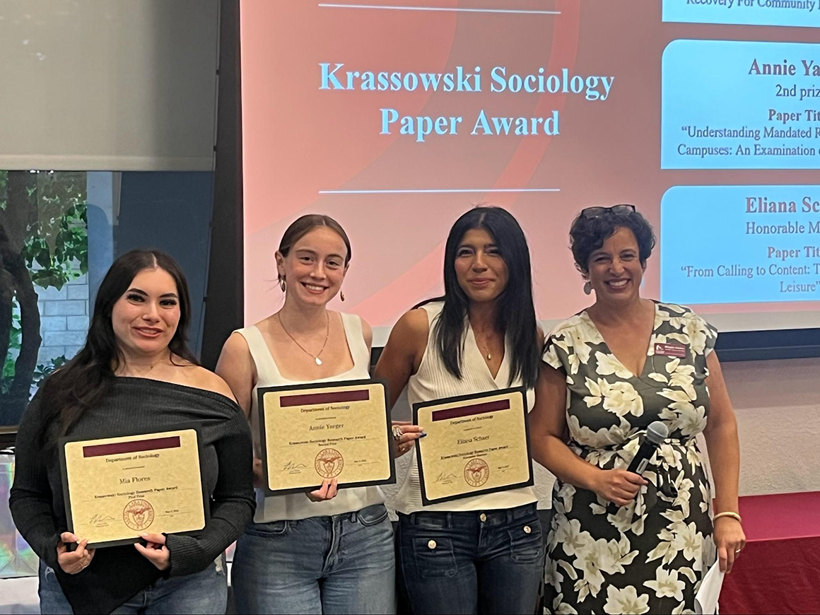 Student awardees of the Krassowski Research Paper Award with Maggie Hunter