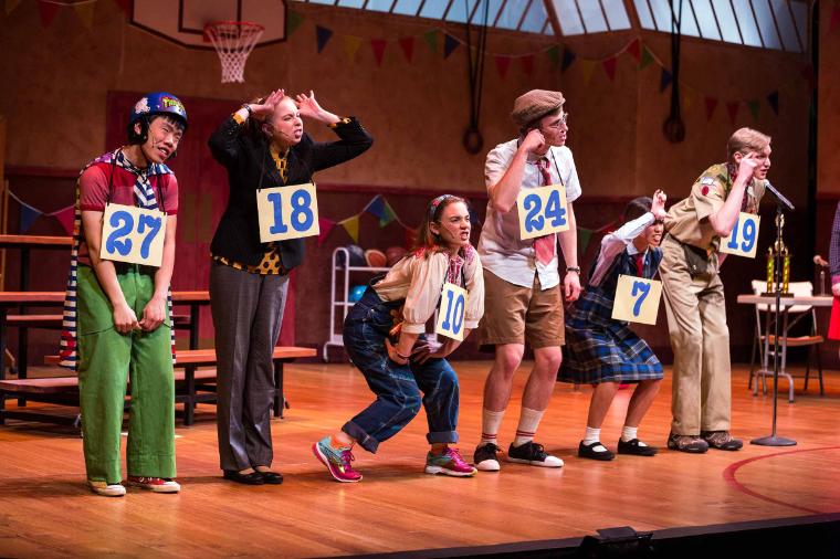 Characters of the spelling bee on stage 