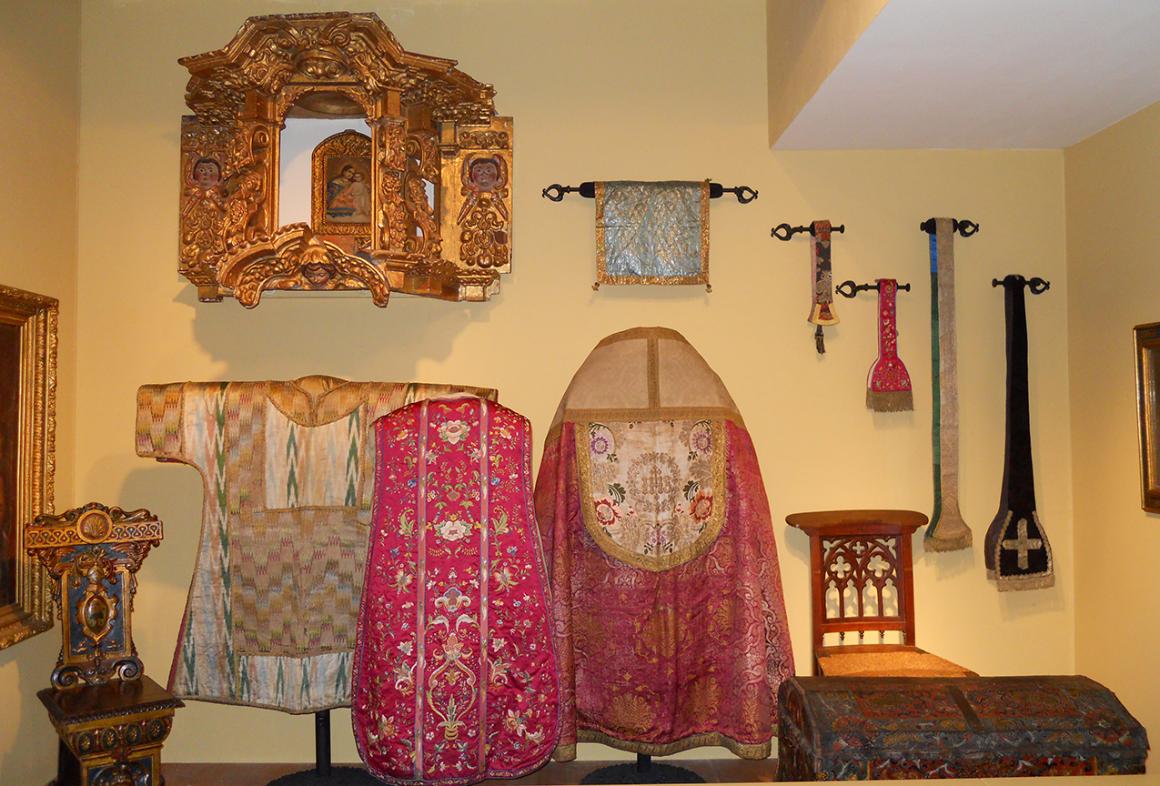 A selection of vestments of different types and patterns from the museums collection.
