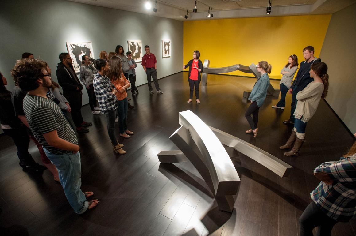 de Saisset curator takes SCU students on a special exhibition tour.