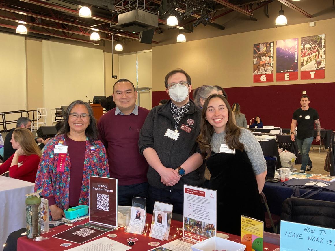 CAPS Team poses for a photo at the 2024 CPSY Practicum Fair.