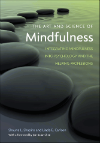 Cover of The Art and Science of Mindfulness by Shapiro and Carlson with smooth stones.
