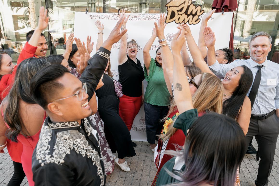 A group of people celebrating 