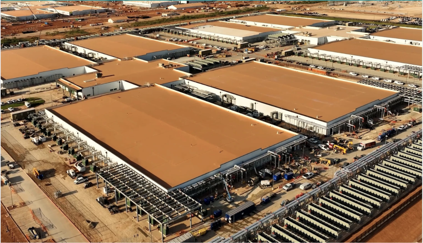 massive industrial data center complex with tan roofs