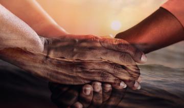 Two hands grasping, like a handshake