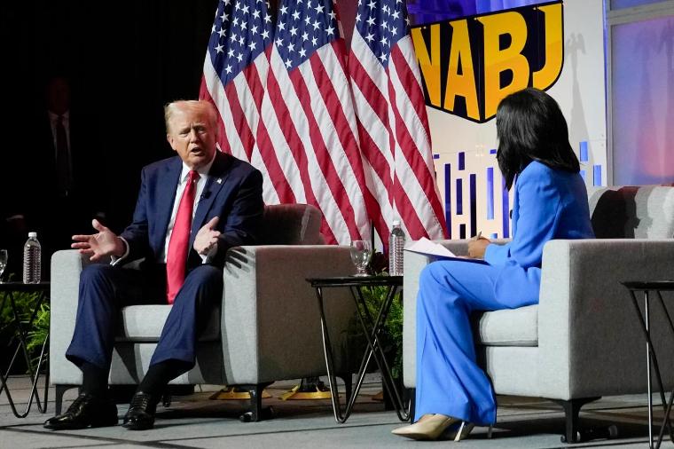 Republican presidential candidate former President Donald Trump, left, moderated by ABCs Rachel Scott, speaks at the National Association of Black Journalists convention, July 31, 2024, in Chicago.