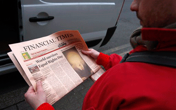 Man reading a newspaper