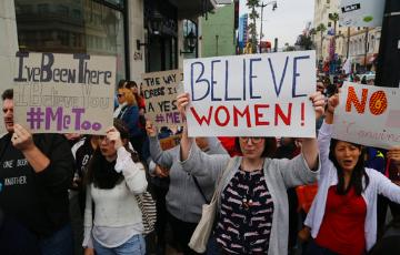 MeToo March (AP Photo/Damian Dovarganes)