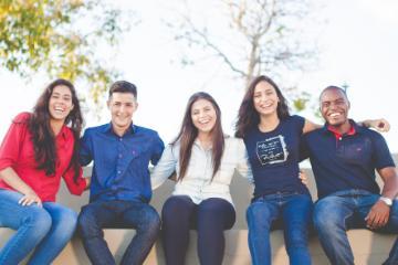 A smiling group of students.