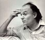 A person in a thoughtful pose with hand on forehead.