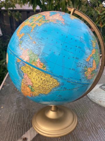 A globe on a table.