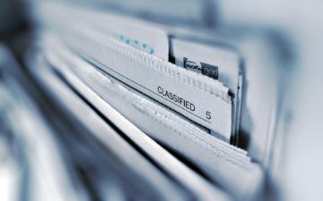 Newspapers in a file. 