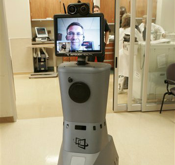 The RP-7 remote presence robotic system at St. Joseph Mercy Hospital in Pontiac, Mich. makes the hospitals specialists available around the clock to any hospital in the state. (AP Photo/Paul Sancya)