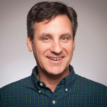 A person smiling, titled Chad Raphael.