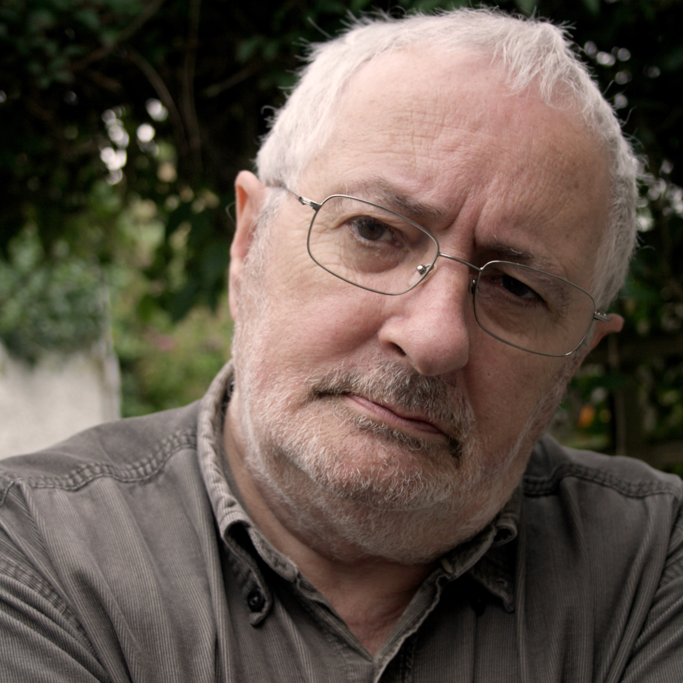 A person with glasses outdoors, titled eagleton terry.
