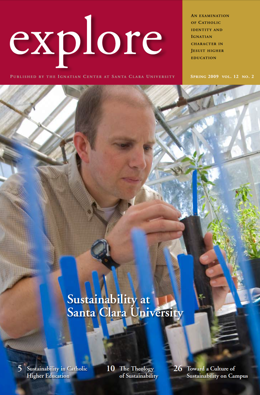 Man in lab working with equipment on Explore magazine cover, Spring 2009 edition.