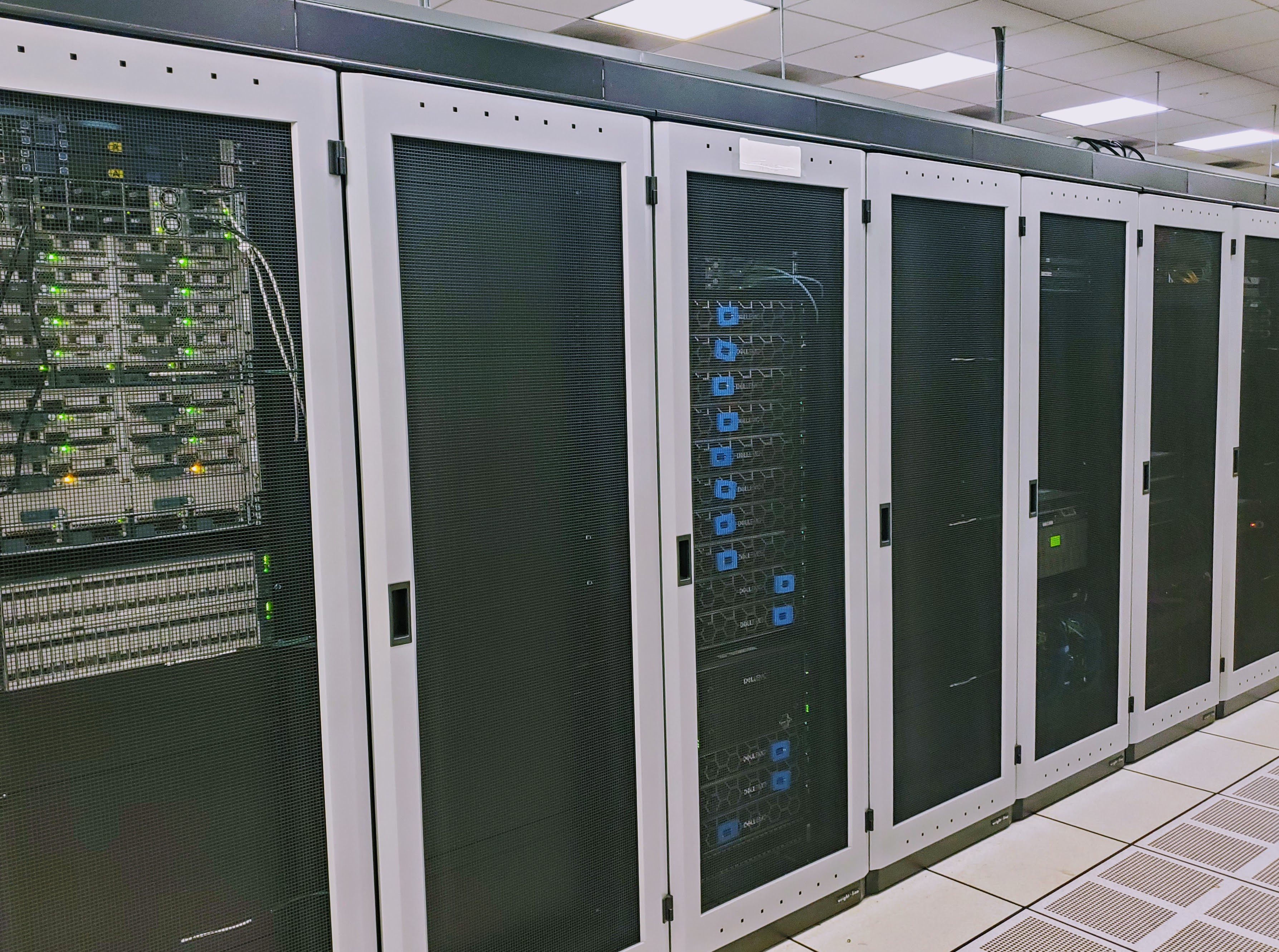 Rows of server racks in a data center.