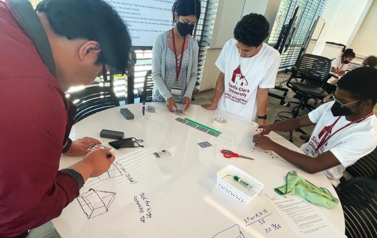 SES Engineering Students around table image link to story