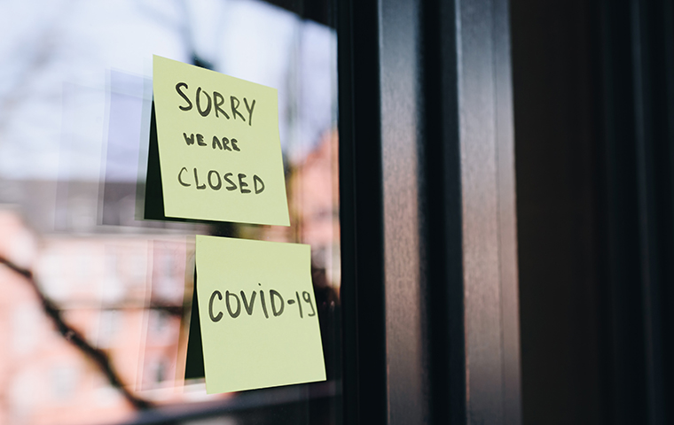 Closed sign on business due to COVID-19