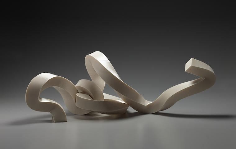 Abstract sculpture titled Coriolis with organic, curving shapes. image link to story