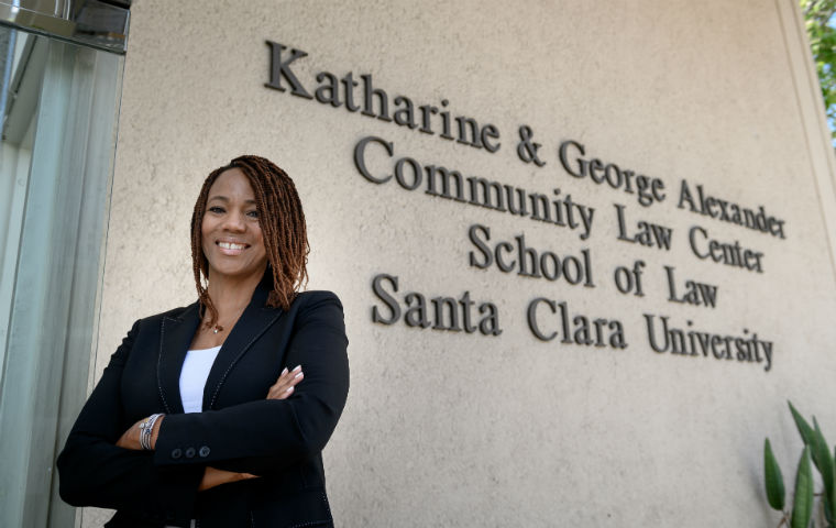 ED Deborah Moss West in front of SCU Laws Alexander Law Center