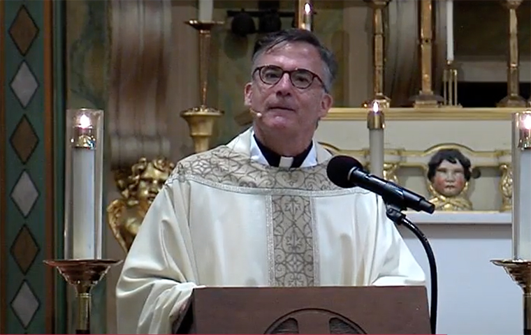 Fr. Kevin OBrien delivering his homily at the Feast of St. Ignatius