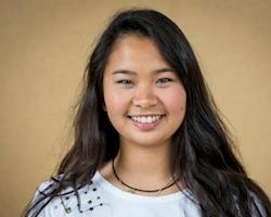 Smiling person against a plain background, titled Rachael Han Johnson Scholar.