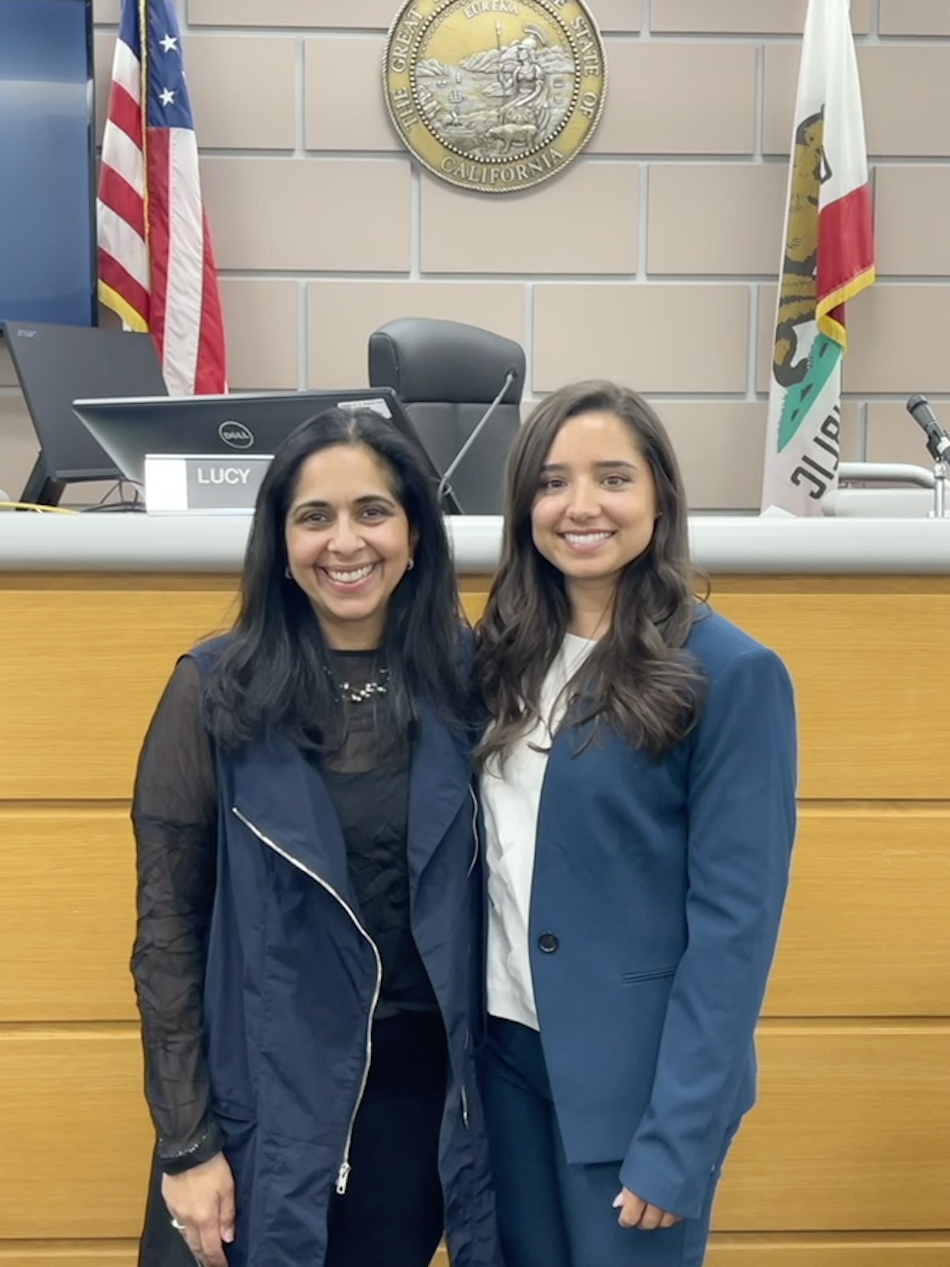 Sharmila Lodhia, associate professor and chair of the Womens and Gender Studies department, pictured with Mirelle Raza at her swearing-in ceremony.