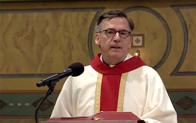 Kevin OBrien, S.J., giving a homily at founders day