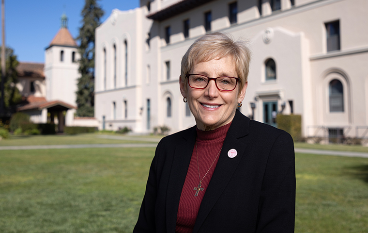 Incoming President Julie Sullivan stands in front of St. Josephs hall