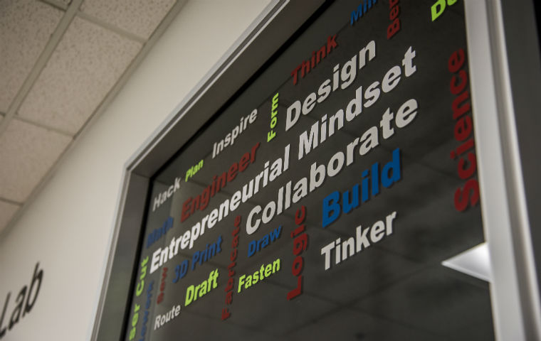 Maker Lab sign with word collaborate