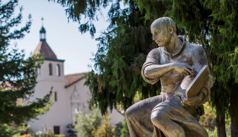 St. Ignatius statue with the Mission Church in the background 