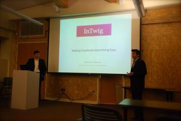 People presenting a slide titled BeAVC in a conference room.