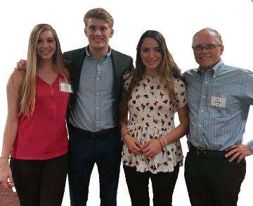 Four people posing for 2018 Cancer Care Point Winners.