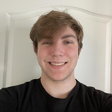Man smiling in black tshirt