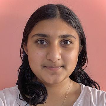 Woman smiling in white tshirt