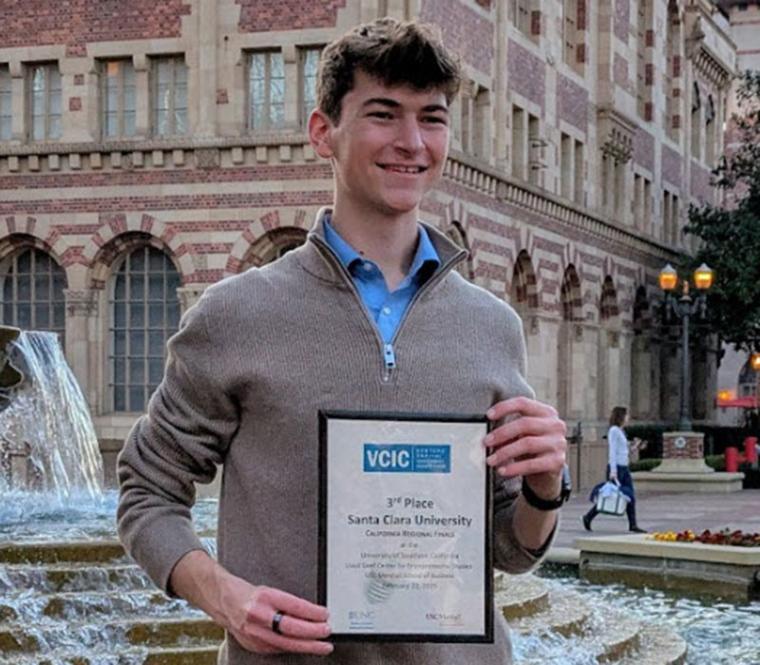Ryan Pool holding 3rd place certificate for VCIC Competition 