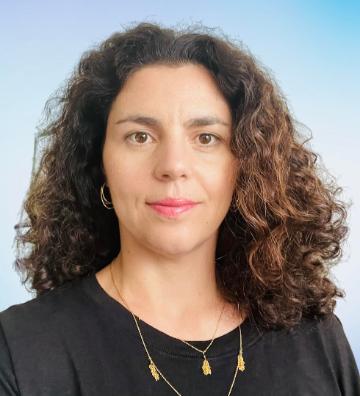 Gabi Dobrescu Lecturer of Economics headshot